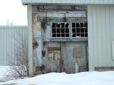 Old-door-under-new-siding.jpg
